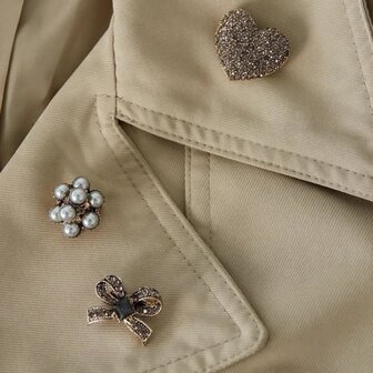 Broche parels taupe