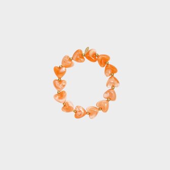 Gouden armband met oranje hartjes