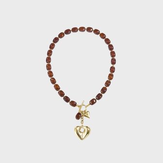 Gouden stainless steel ketting met vierkante bruine kralen en hart bedel