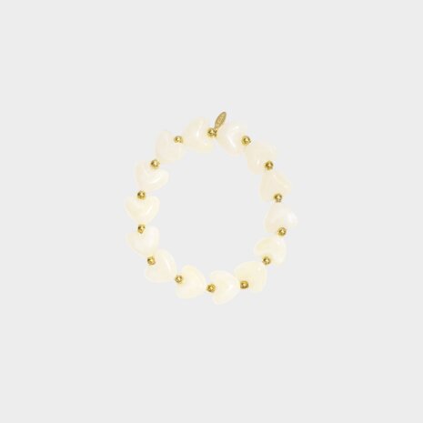 Gouden armband met witte hartjes