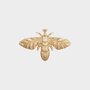Broche bij goud